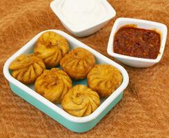 Fried Momos is a Traditional Dumpling Food From Nepal photo