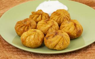 Fried Momos is a Traditional Dumpling Food From Nepal photo