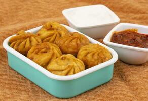 Fried Momos is a Traditional Dumpling Food From Nepal photo