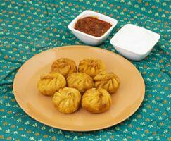 Fried Momos is a Traditional Dumpling Food From Nepal photo