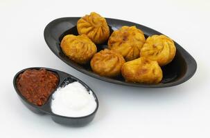 Fried Momos is a Traditional Dumpling Food From Nepal photo