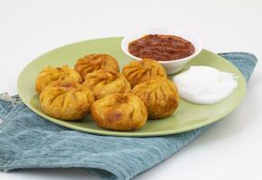 Fried Momos is a Traditional Dumpling Food From Nepal photo