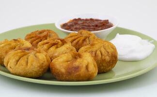 Fried Momos is a Traditional Dumpling Food From Nepal photo