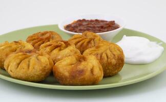 Fried Momos is a Traditional Dumpling Food From Nepal photo