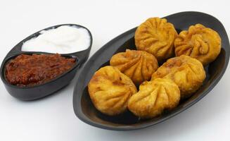 Fried Momos is a Traditional Dumpling Food From Nepal photo