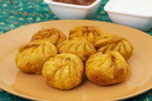 Fried Momos is a Traditional Dumpling Food From Nepal photo