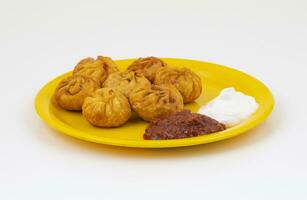 Fried Momos is a Traditional Dumpling Food From Nepal photo