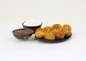 Fried Momos is a Traditional Dumpling Food From Nepal photo