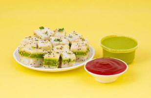 Sandwich Dhokla or Sandwich Khaman is an Indian Popular Snack photo