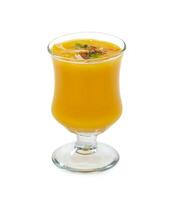 Fresh mango fruit juice on white background photo