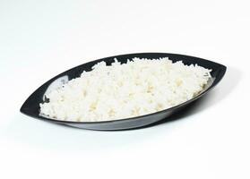 bowl of boiled rice on white background photo