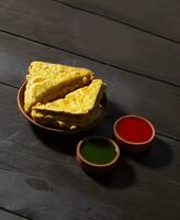 Indian Fried Snack Bread Pakora or Bread Bhaji Served with Tomato Ketchup, Green Chutney it is Made From Bread Slices photo