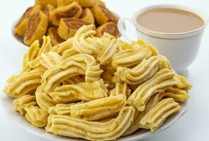 Indian Traditional Spicy Snack Ghatiya With Bhakarwadi Are Deep Fried Snack Made From Chickpea Flour photo