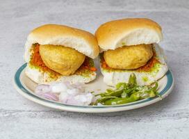 Indian Famous Street Food Vada Pav is a Vegetarian Fast Food Dish From Maharashtra photo