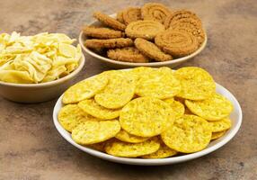 Indian Street Snack Food Masala Khari Papdi with Chakli or Besan Papdi photo