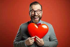 AI generated Portrait of a happy man with a red heart on Valentine's day concept. photo