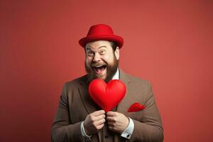 ai generado retrato de un contento hombre con un rojo corazón en San Valentín día concepto. foto