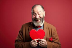 AI generated Portrait of a happy man with a red heart on Valentine's day concept. photo