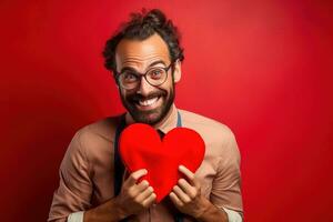 AI generated Portrait of a happy man with a red heart on Valentine's day concept. photo