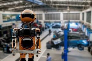 Robot Technology AI fix car repair on car Lift in garage dealership Fix the car with a touch touching UI screen interface point to the point that needs to corrected New technology in IOT car industry photo