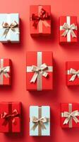 AI generated red gift boxes on a solid red vertical background photo