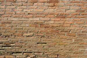 Detail of a brown brick wall texture and background with copy space photo