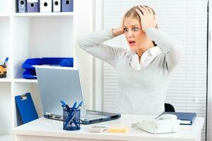 Image of shocked businesswoman photo