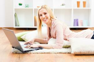 Woman using laptop photo