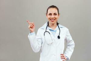 Beautiful female doctor gesturing photo