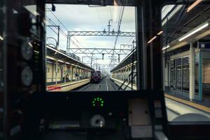traveling by trains to kyoto japan photo