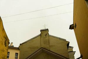 Vintage Walls of Old Houses in the Historic Downtown Area of the City photo