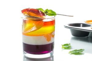 lot of colored sweet fruit jelly in a glass photo