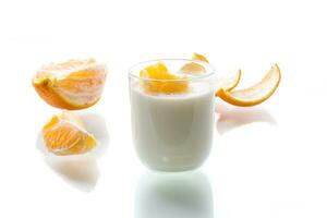 homemade sweet yogurt in a glass with oranges photo