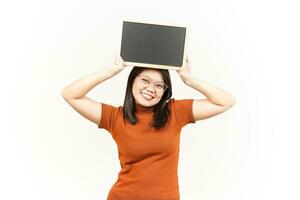 Showing, Presenting and holding Blank Blackboard Of Beautiful Asian Woman Isolated On White Background photo