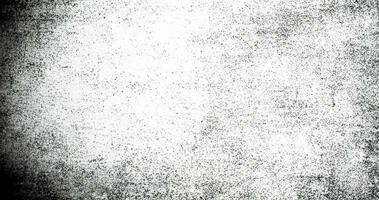 Subtle halftone grunge urban texture vector. Distressed overlay texture. Grunge background. Abstract mild textured effect. Vector Illustration. Black isolated on white. photo
