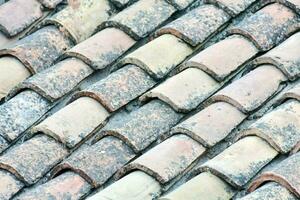 a close up of a roof with many different types of tiles photo