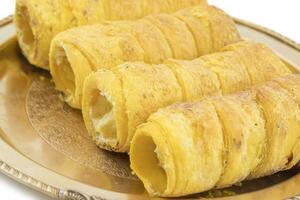 Indian Sweet Dish Puff Roll with Cream photo