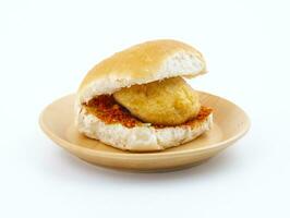 Indian Famous Street Food Vada Pav is a Vegetarian Fast Food Dish From Maharashtra photo