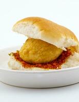 Indian Famous Street Food Vada Pav is a Vegetarian Fast Food Dish From Maharashtra photo