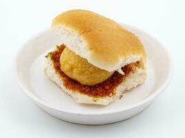 Indian Famous Street Food Vada Pav is a Vegetarian Fast Food Dish From Maharashtra photo