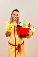 Portrait of happy housewife showing thumb up photo