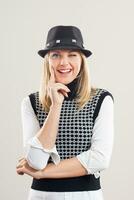 Cute woman with a hat  winking photo