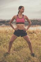 Beautiful woman exercising outdoor photo