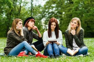 Female students thinking while learning photo