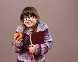 Healthy snack for little nerdy girl photo