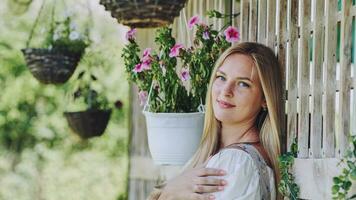 German girl posing outside the house. photo