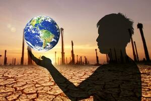 Love the earth and protect the environment concept. Earth day. Earth in people's hands. photo
