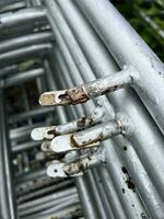 metal nails are placed on a white background. photo