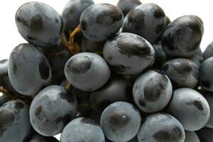 Close-up of tasty grapes cluster photo