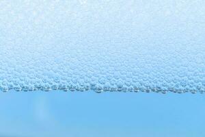 Close up background photo of many  bubbles isolated, Many small bubbles texture close up still abstract background